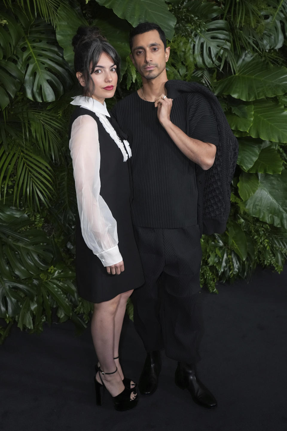 From left, Fatima Farheen Mirza and Riz Ahmed arrive at Chanel's 15th Annual Pre-Oscar Awards Dinner on Saturday, March 9, 2024, at the Beverly Hills Hotel in Los Angeles. (Photo by Jordan Strauss/Invision/AP)