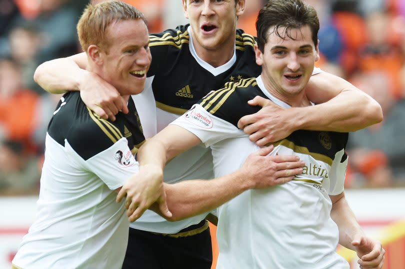 McLean's improvised looping header saw the Dons snatch a late victory in the "New Firm" derby