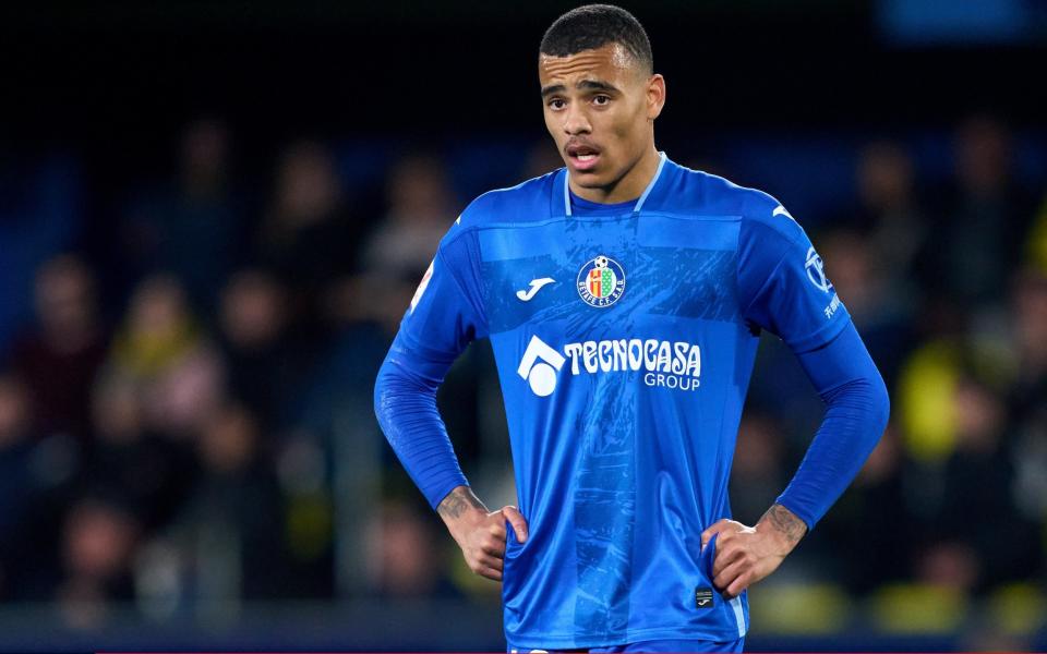 Mason Greenwood playing for Spanish club Getafe/Antony police investigations threaten Man Utd hopes to sell £85m flop