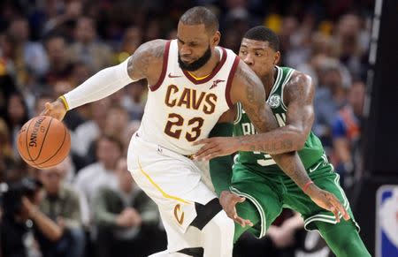 Oct 17, 2017; Cleveland, OH, USA; Boston Celtics guard Marcus Smart (36) defends Cleveland Cavaliers forward LeBron James (23) during the second half at Quicken Loans Arena. Mandatory Credit: Ken Blaze-USA TODAY Sports