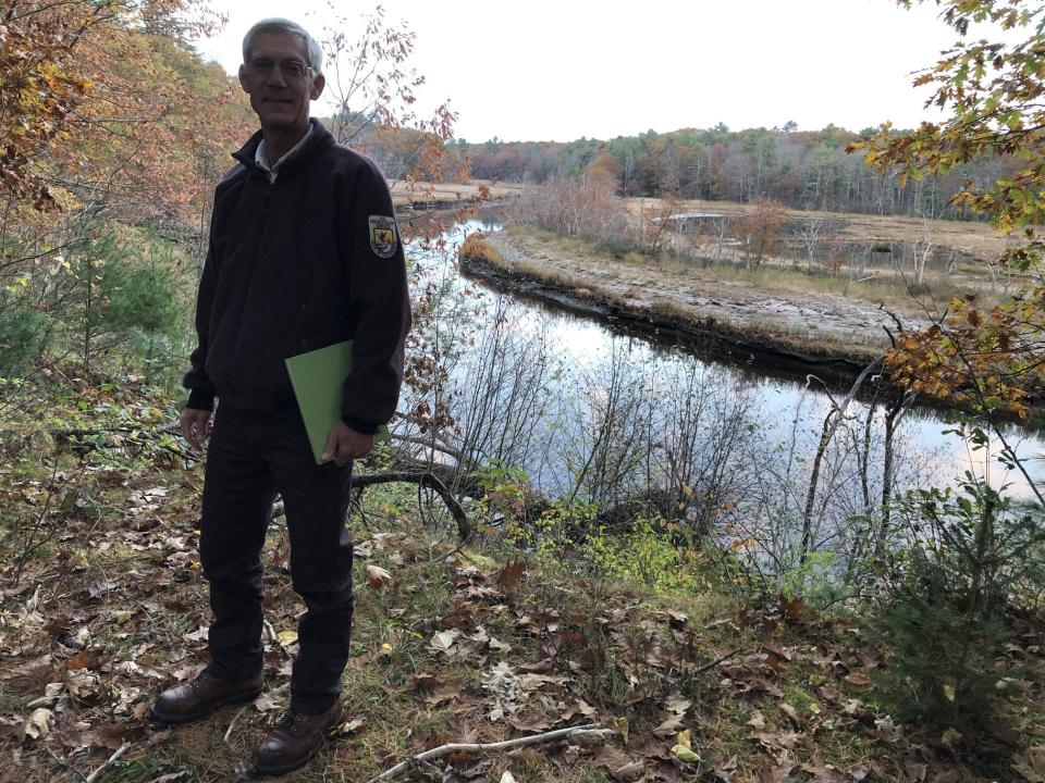Karl Stromayer, the project manager for the Rachel Carson National Wildlife Refuge, is seen here at the breathtaking perch overlooking the Mousam River in Kennebunk, Maine, on Nov. 3, 2023. The spot is part of the land the refuge acquired in 2019.