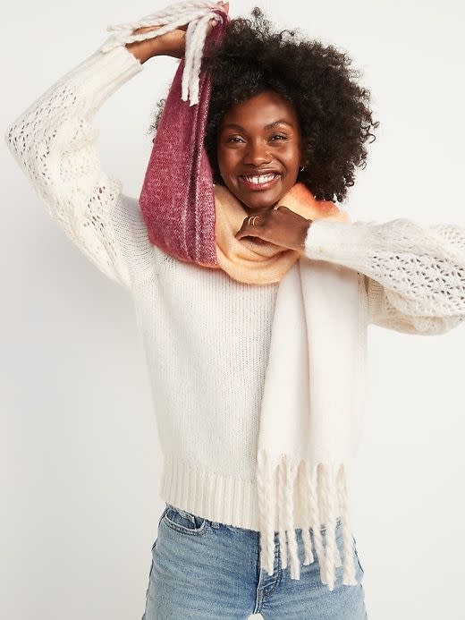 <p><strong>Old Navy</strong></p><p>oldnavy.gap.com</p><p><strong>$20.00</strong></p><p><a href="https://go.redirectingat.com?id=74968X1596630&url=https%3A%2F%2Foldnavy.gap.com%2Fbrowse%2Fproduct.do%3Fpid%3D765082022%26pcid%3D999%26vid%3D1%26searchText%3Dscarves%23pdp-page-content&sref=https%3A%2F%2Fwww.countryliving.com%2Fshopping%2Fgifts%2Fg38212654%2Fbest-winter-scarves%2F" rel="nofollow noopener" target="_blank" data-ylk="slk:Shop Now;elm:context_link;itc:0;sec:content-canvas" class="link ">Shop Now</a></p><p>Made from looped yarn, which gives it a pleasing, nubby texture, this scarf also features handsome braided-fringe trim.</p>