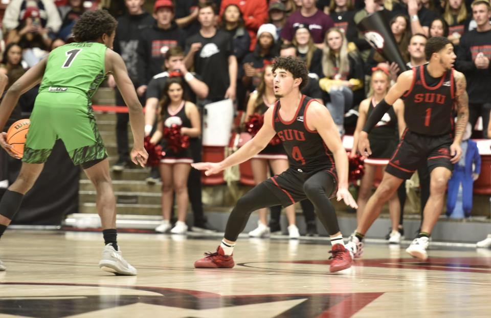 Le'Tre Darthard of Utah Valley prepares to go to work against his Southern Utah opponent.