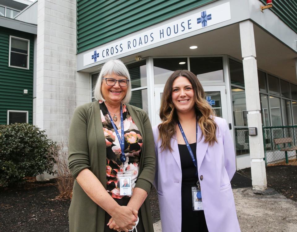 Sandy Beaudry, left, and Allyson McCormick work together at Cross Roads House in Portsmouth, where an increased demand could be seen as funding for hotel rooms for people in need of housing expires.