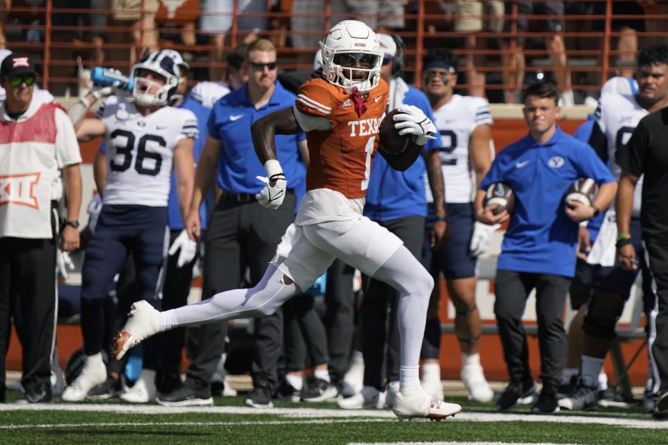 Texas’ Xavier Worthy (1) returns a punt for a touchdown against BYU during the first half of an NCAA college football game in Austin, Texas, Saturday, Oct. 28, 2023. | Eric Gay, Associated Press