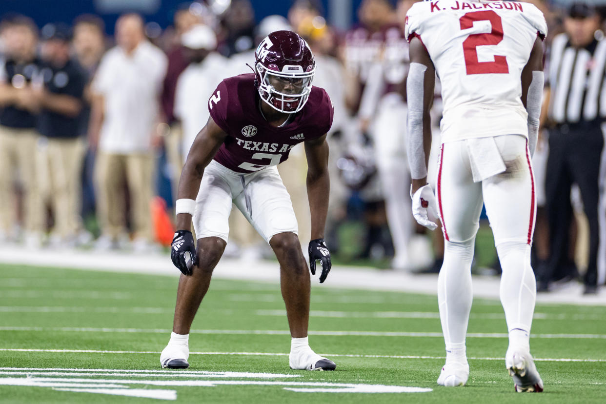 ARLINGTON, TX - SEPTEMBER 24: Texas A&M Aggies cornerback Denver Harris (#2) lines up opposite Arkansas Razorbacks wide receiver Ketron Jackson Jr. (#2) during the Southwest Classic college football game between the Texas A&M Aggies and the Arkansas Razorbacks on September 24, 2022 at AT&T Stadium in Arlington, TX.  (Photo by Matthew Visinsky/Icon Sportswire via Getty Images)