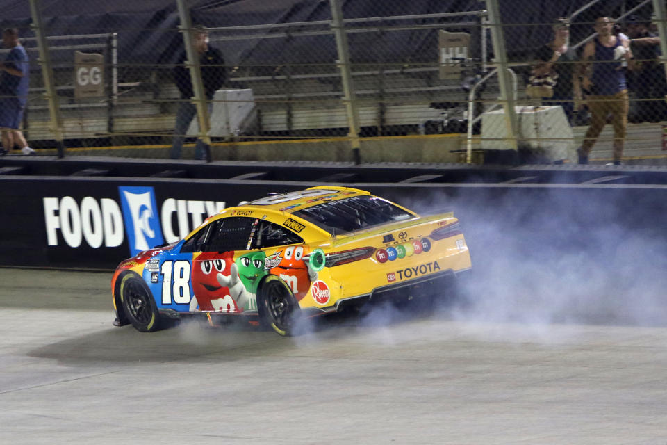 BRISTOL, TN - SEPTEMBER 17: Kyle Busch (#18 Joe Gibbs Racing M&M's Toyota) devolops engine problems during the running of the NASCAR Cup Series Playoff Bass Pro Shops  Night Race on September 17, 2022 at Bristol Motor Speedway in Bristol, TN. (Photo by Jeff Robinson/Icon Sportswire via Getty Images)