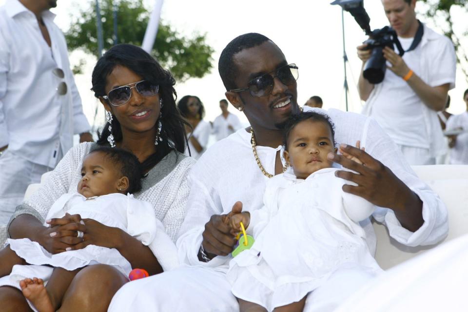 Combs and Kim Porter with their twin daughters Lila Star Combs and Jessie James Combs (Getty Images)