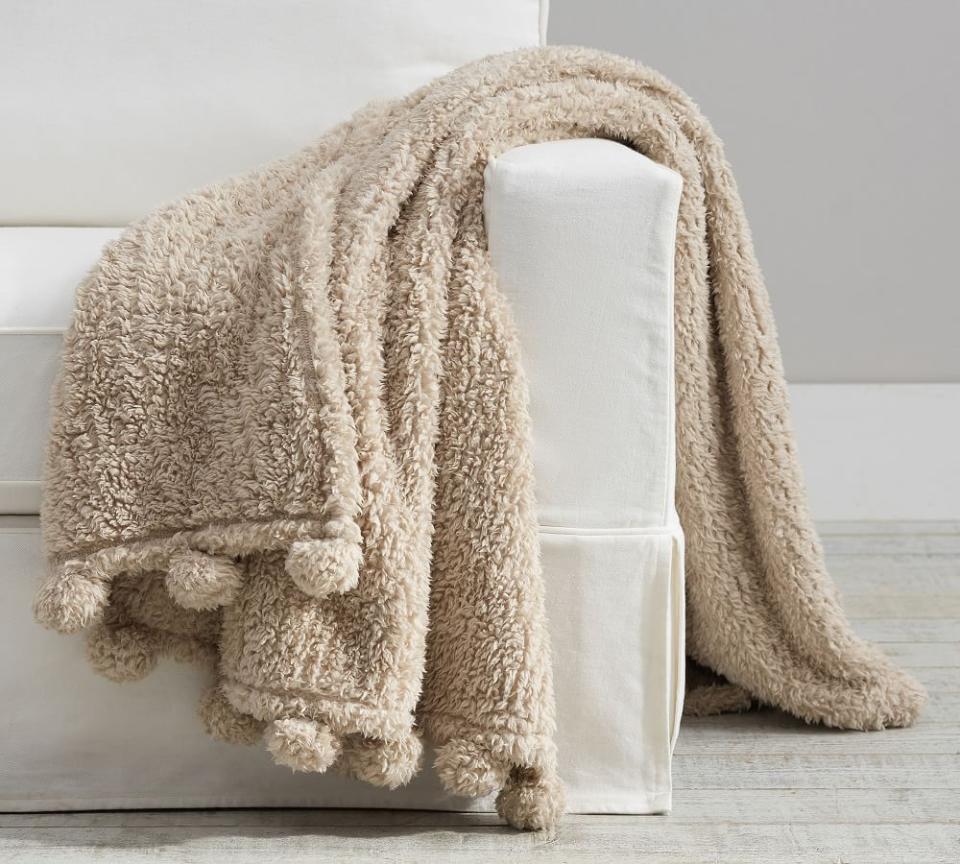 <p><a href="https://go.redirectingat.com?id=74968X1596630&url=https%3A%2F%2Fwww.potterybarn.com%2Fproducts%2Fcozy-pom-pom-throw&sref=https%3A%2F%2Fwww.cosmopolitan.com%2Fstyle-beauty%2Ffashion%2Fg12838307%2Fwarm-cozy-gifts%2F" rel="nofollow noopener" target="_blank" data-ylk="slk:Shop Now;elm:context_link;itc:0;sec:content-canvas" class="link ">Shop Now</a></p><p>Cozy Pom Pom Sherpa Throw </p><p>potterybarn.com</p><p>$29.00</p>