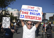 <p>David Criswell holds up a sign as he marches with protesters in San Francisco, Saturday, Aug. 26, 2017. (Photo: Josh Edelson/AP) </p>