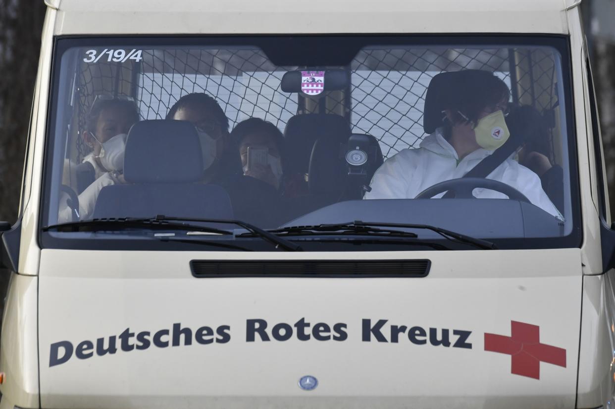 A van of the German Red Cross (DRK) carrying German citizens repatriated from the chinese city affected by the corona virus, Wuhan arrives at the German Red Cross (DRK) hospital in Berlin Kopenick, on February 9, 2020. - A plane of the German Air Force with twenty Germans from the Chinese city of Wuhan, which is particularly affected by the corona virus, landed in Berlin-Tegel on February 9, 2020. (Photo by John MACDOUGALL / AFP) (Photo by JOHN MACDOUGALL/AFP via Getty Images)