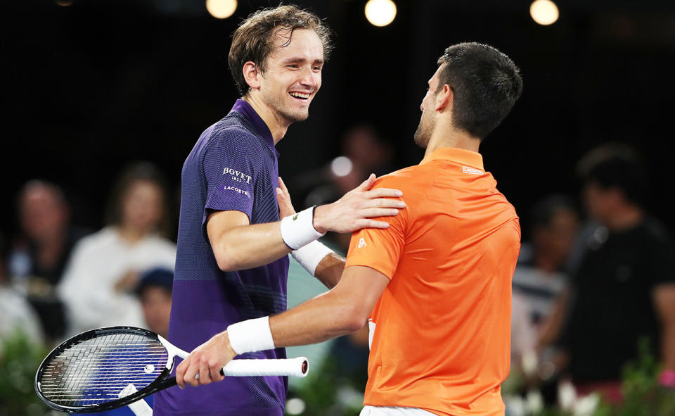 Daniil Medvedev and Novak Djokovic, pictured here after their match in Adelaide.