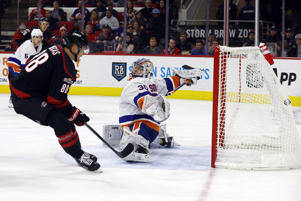 Carolina Hurricanes' Martin Necas (88) shoots the puck past New York Islanders goaltender Ilya Sorokin (30) for a goal during the second period of an NHL hockey game in Raleigh, N.C., Friday, Oct. 28, 2022. (AP Photo/Karl B DeBlaker)