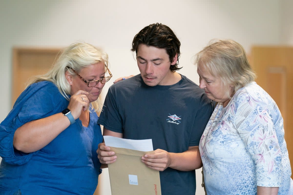 Will Colman reacts as he receives his A-level results at Langley School in Loddon, Norfolk (PA)