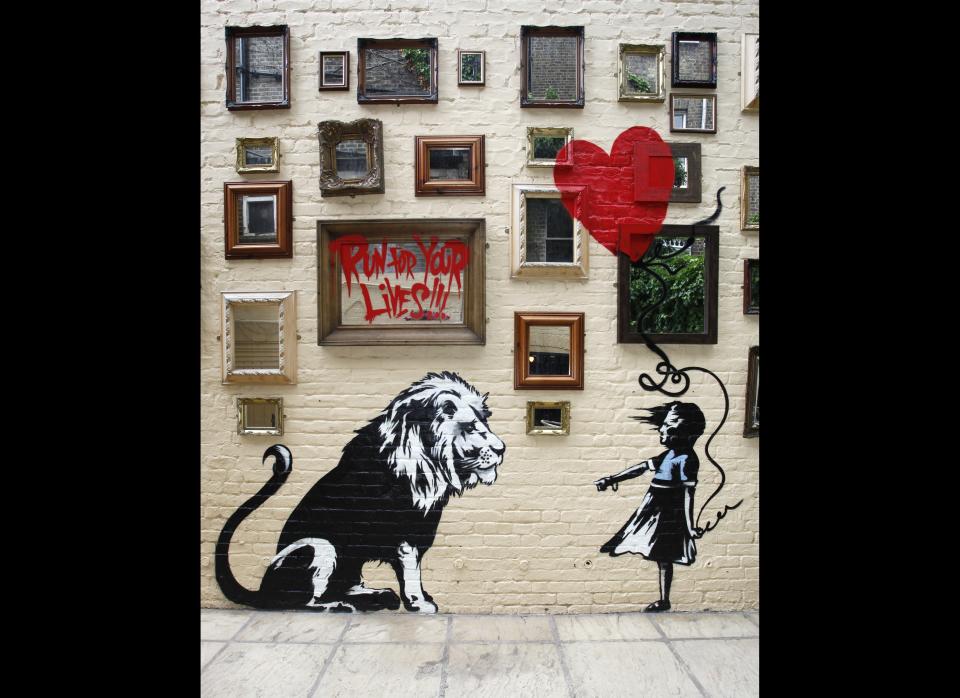 LONDON, UNITED KINGDOM - JUNE 14: New Banksy Mural at The Princess of Wales Pub in Primrose Hill on June 14, 2010 in London, England. (Photo by Neil Mockford/Getty Images)