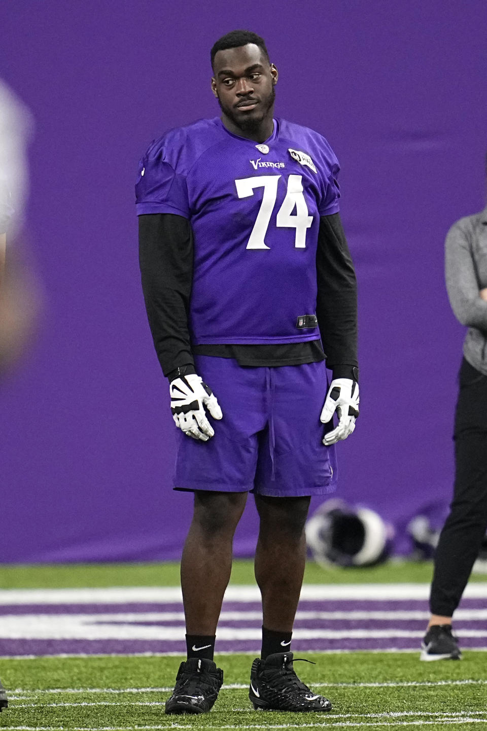 Minnesota Vikings guard Olisaemeka Udoh (74) stands on the field during an NFL football team practice in Eagan, Minn., Wednesday, Jan. 11, 2023. The Vikings will play the New York Giants in a wild-card game on Sunday. (AP Photo/Abbie Parr)