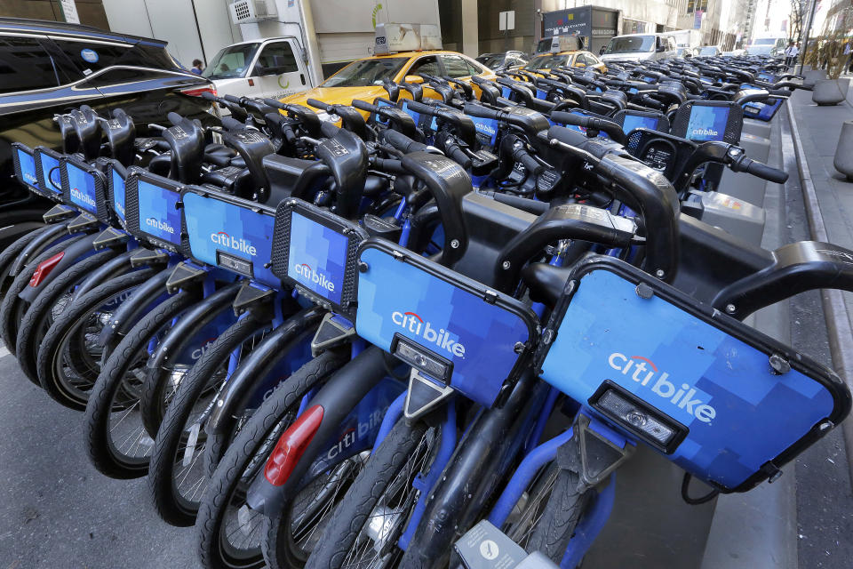 File - A collection of 208 Citibikes are parked adjacent to the 666 Fifth Avenue building, in New York. At the dawn of 2024, also known as New Year's resolution season, there are lots of small, easily achievable ways to lead more climate friendly lives. (AP Photo/Richard Drew, File)