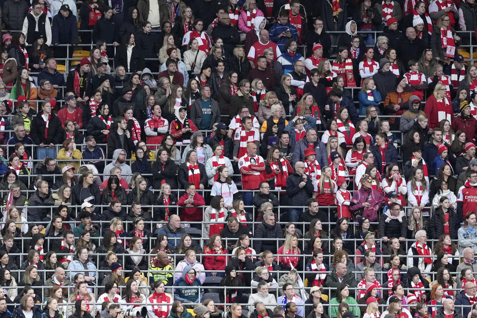 Arsenal fans watch on during the FA Women's Continental Tyres League Cup Final at Molineux Stadium, Wolverhampton, England, Sunday March 31, 2024. (Nick Potts/PA via AP)
