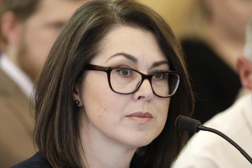 Republican Sen. Deidre Henderson looks on during a hearing Monday, Feb. 10, 2020, in Salt Lake City. Polygamists have lived in Utah since before it became a state, and 85 years after the practice was declared a felony they still number in the thousands. Now, a state lawmaker says it's time to remove the threat of jail time for otherwise law-abiding polygamists. "The law is a failure. It hasn't stopped polygamy at all and it's actually enabled abuse to occur and remain unchecked," said Henderson. (AP Photo/Rick Bowmer)