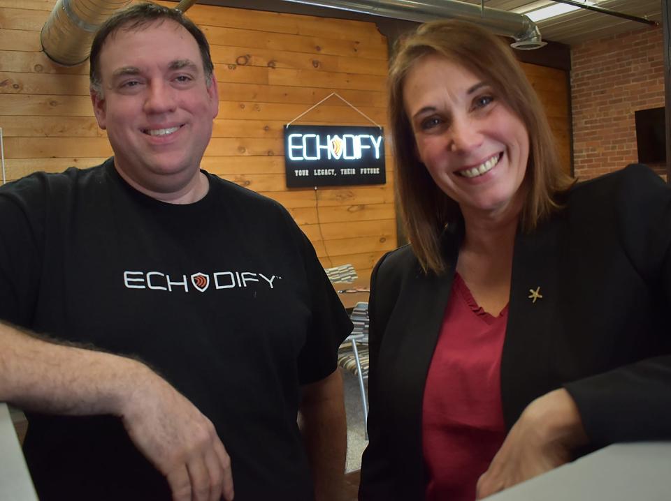 Kevin and Lisa Desforges, the CEO and COO of Echodify, stand in their office on Pond Street in Fall River on Friday, April 12, 2024.