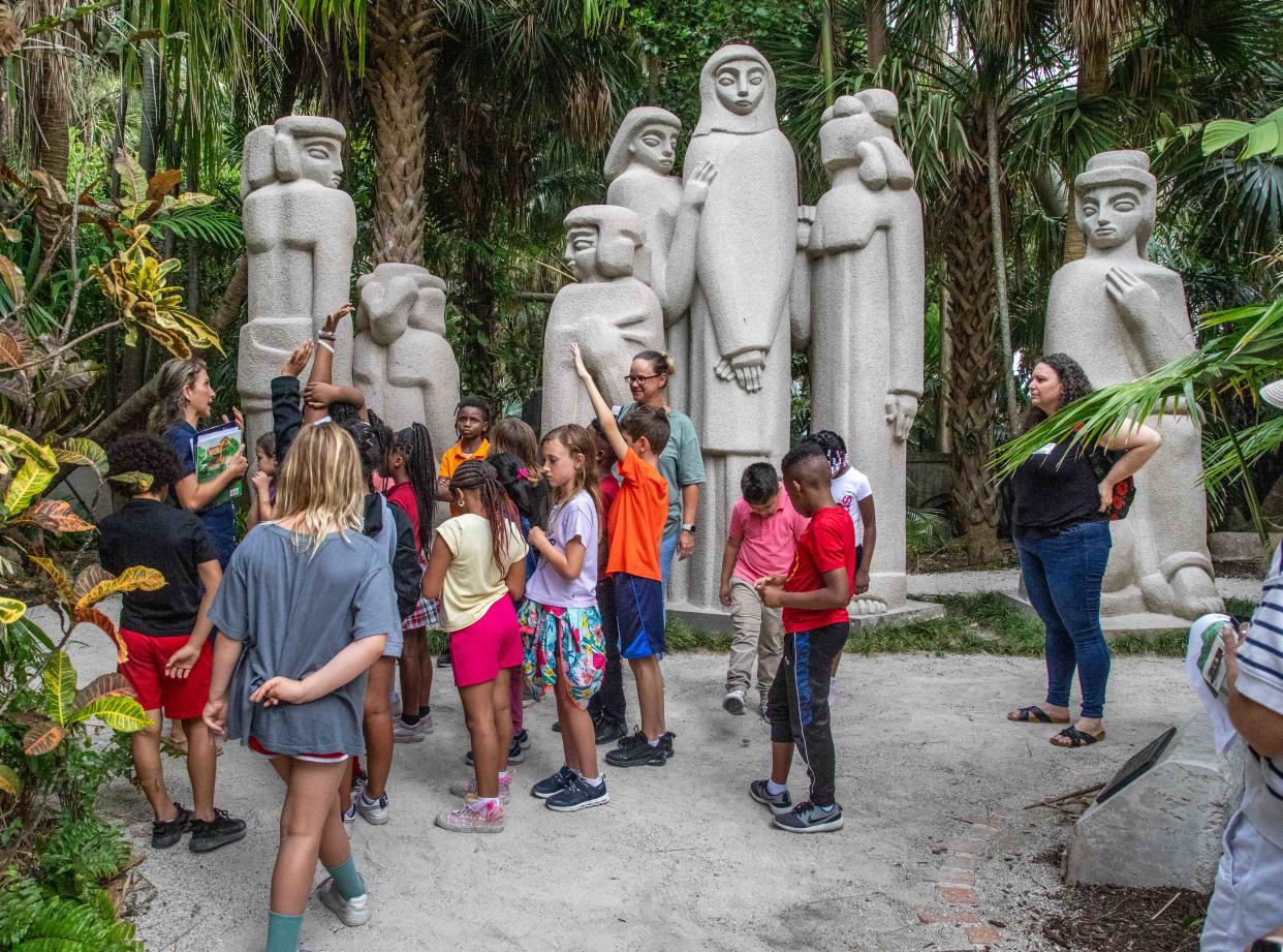 Second graders from The Conservatory School learn about artist Ann Norton during the EARTH DAY CELEBRATION at the Ann Norton Sculpture Gardens on Monday.