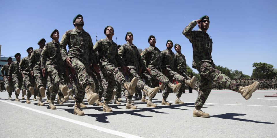 Afghan National Army march during their graduation ceremony from a 3-month training program at the Afghan Military Academy in Kabul, Afghanistan, Monday, May 27, 2019. (AP Photo/Rahmat Gul)