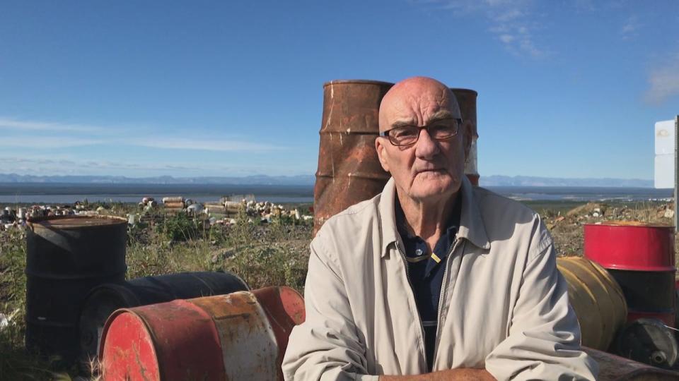 Frank Pope, the mayor in Norman Wells, is calling on upper levels of government for help removing legacy waste from the town's landfill and abandoned lots around town. 
