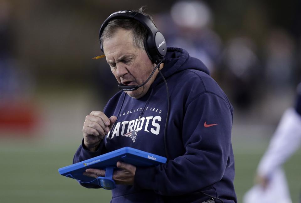 Don't expect to see Bill Belichick holding a Microsoft Surface anytime soon. (AP)