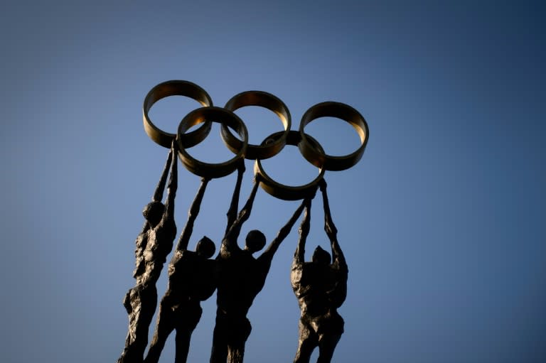 A statue of the Olympic Rings -- which represent the world's five continents -- outside the the International Olympic Committee (IOC) headquarters in Lausanne, Switzerland