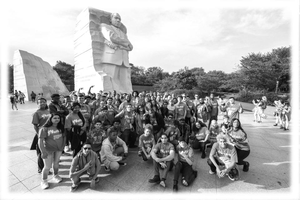 Youth delegates from YouthBuild programs across the US gather in front of the Martin Luther King, Jr. Memorial in Washington DC in June. YouthBuild is a partner of the Serve America Together Campaign. (Photo: courtesy of Denny Henry; digitally enhanced by Yahoo News)