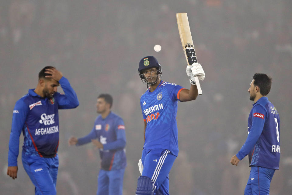 Shivam Dube of India celebrates scoring fifty runs during the first T20 cricket match between India and Afghanistan in Mohali, India, Thursday, Jan. 11, 2024. (AP Photo/Surjeet Yadav)