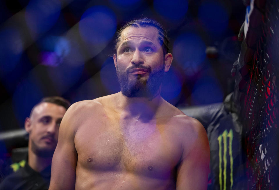 Jorge Masvidal celebrates his knockout victory over Ben Askren during their welterweight mixed martial arts bout at UFC 239, Saturday, July 6, 2019, in Las Vegas. Masvidal won by the fastest knockout in UFC history. (AP Photo/Eric Jamison)