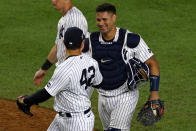 New York Yankees catcher Gary Sanchez, right, celebrates with Luis Cessa after defeating the New York Mets during the eighth inning of the second baseball game of a doubleheader, Sunday, Aug. 30, 2020, in New York. (AP Photo/Adam Hunger)
