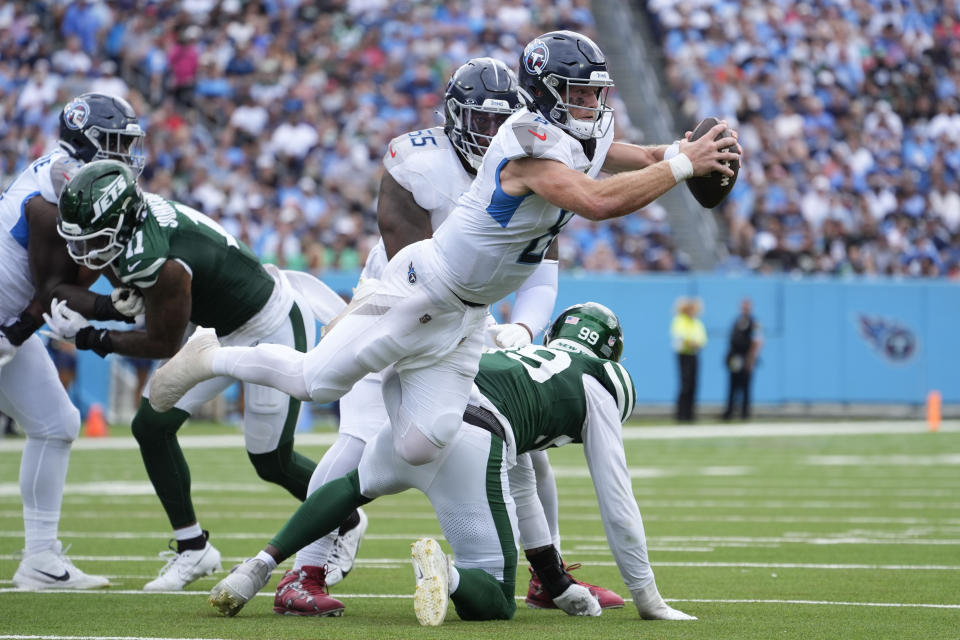 Tennessee Titans quarterback Will Levis (8) fumbles the ball in the first half of an NFL football game against the New York Jets in Nashville, Tenn., on Sunday, Sept. 15, 2024. (AP Photo/George Walker IV)