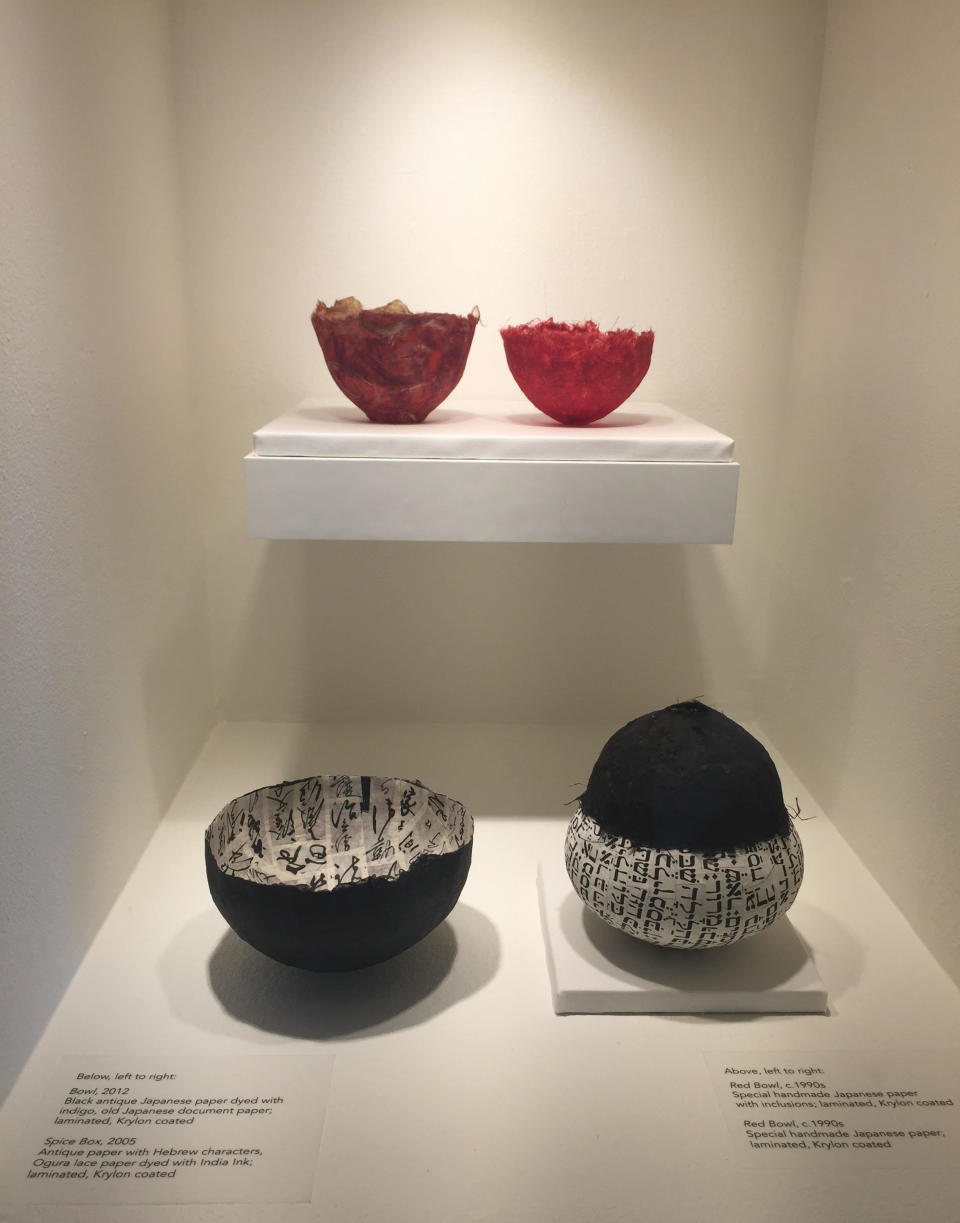 This photo taken on Dec. 2, 2016 shows three bowls and a spice box by Berkeley, Calif., based 90-year-old fiber artist and weaver Kay Sekimachi. The pieces are part of the "Kay Sekimachi: Simple Complexity" exhibit the Craft and Folk Art Museum in Los Angeles, chronicling Sekimachi's decades-long career. The exhibit opened on Sept. 25, 2016, and runs through Jan. 8, 2017. (Solvej Schou via AP)