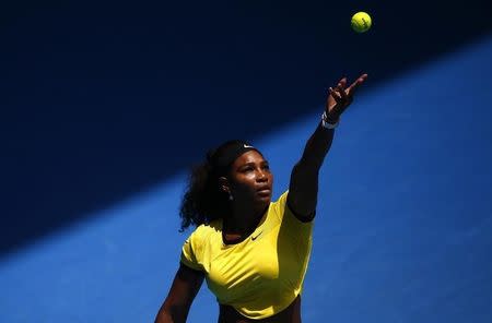 Serena Williams of the U.S. serves during her quarter-final match against Russia's Maria Sharapova at the Australian Open tennis tournament at Melbourne Park, Australia, January 26, 2016. REUTERS/Jason O'Brien Action Images via Reuters -