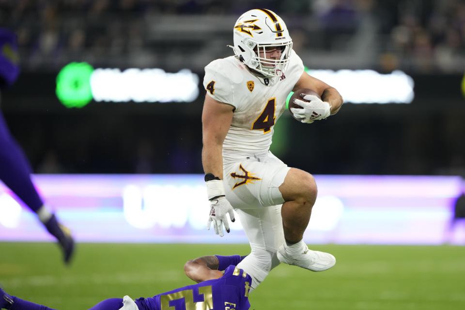 Arizona State running back Cameron Skattebo runs with the ball against Washington Saturday, Oct. 21, 2023, in Seattle. A threat both rushing the ball and receiving it, the Utah defense will need to know where Skattebo is at all times. | Lindsey Wasson, Associated Press