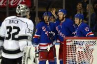 Dec 15, 2017; New York, NY, USA; New York Rangers right wing Kevin Hayes (13) celebrates his goal against Los Angeles Kings goalie Jonathan Quick (32) with right wing Michael Grabner (40) and right wing Jesper Fast (17) during the second period at Madison Square Garden. Mandatory Credit: Brad Penner-USA TODAY Sports