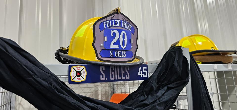 The locker of volunteer firefighter Shawn Giles, 53, is shown Tuesday, Aug. 22, 2023, two days after Giles was struck and killed while directing traffic on Route 20 in North East. Giles had been a member of the Fuller Hose Co. in North East for 13 years.