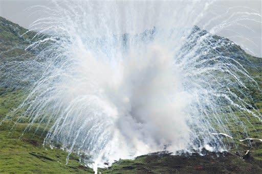 A white phosphorous shell explodes on target during the Lien Yung annual joint forces exercises in Pingtung Count, Taiwan.
