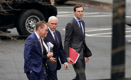 Acting White House Chief of Staff Mick Mulvaney, U.S. Secretary of Homeland Security Kirstjen Nielsen (obscured), U.S. Vice President Mike Pence and Senior White House Advisor Jared Kushner walk from the West Wing before a meeting with Congressional staffers about ending the partial government shutdown at the White House in Washington, U.S., January 5, 2019. REUTERS/Joshua Roberts