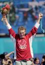 17 Sep 2000: Simon Whitfield of Canada celebrates his Gold Medal victory of the Men's Triathlon at the Sydney Opera House in Sydney, Australia.Mandatory Credit: Donald Miralle /Allsport