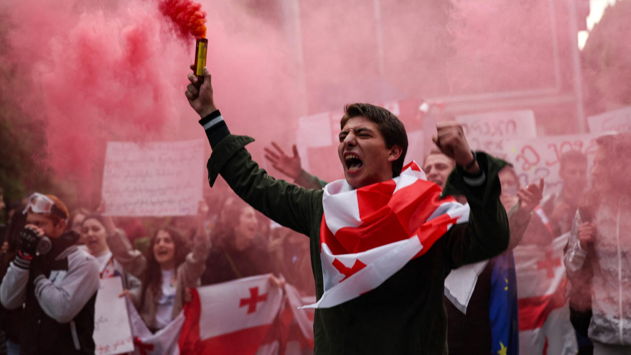  Protesters in Tbilisi rage against "Russian law". 