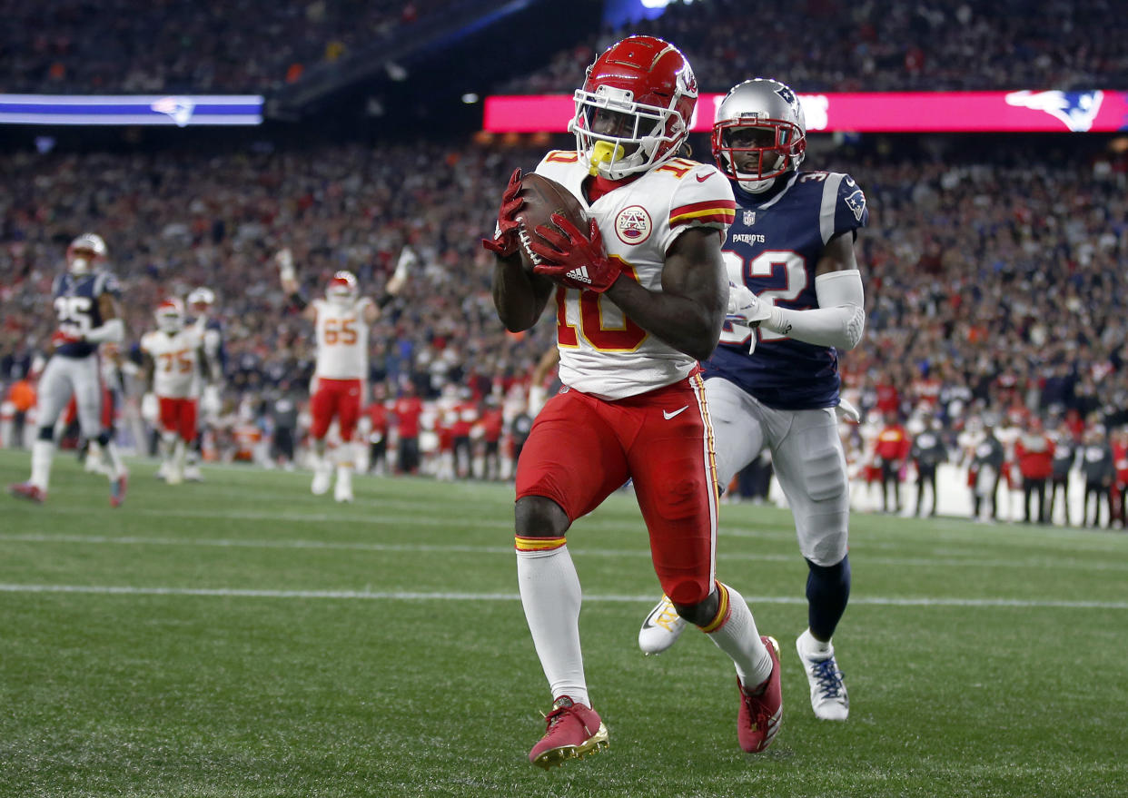 Tyreek Hill scoring one of his three touchdowns on Sunday night against the Patriots. (AP)