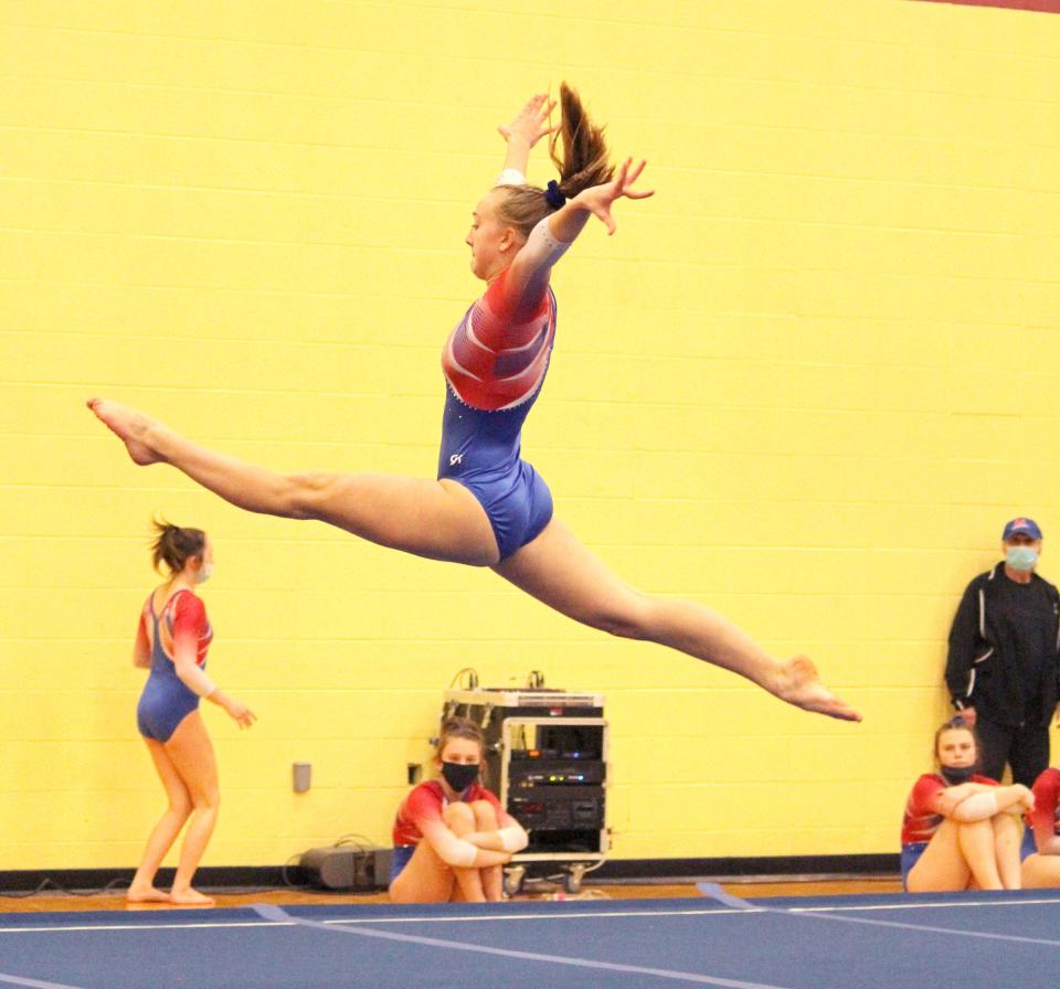 Martinsville gymnast Laney Carrell demonstrates her skills during a gymnastics meet in the first part of 2021. The team reached the state finals. 