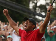 Golf - Masters - Augusta National Golf Club - Augusta, Georgia, U.S. - April 14, 2019. Tiger Woods of the U.S. celebrates on the 18th hole to win the 2019 Masters. REUTERS/Jonathan Ernst