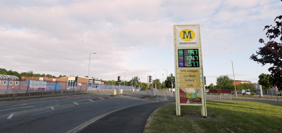 A Morrisons supermarket sign selling unleaded petrol at 99.7p per litre at its store in Belle Vale, Liverpool, after the chain reduced its prices across its UK forecourts.