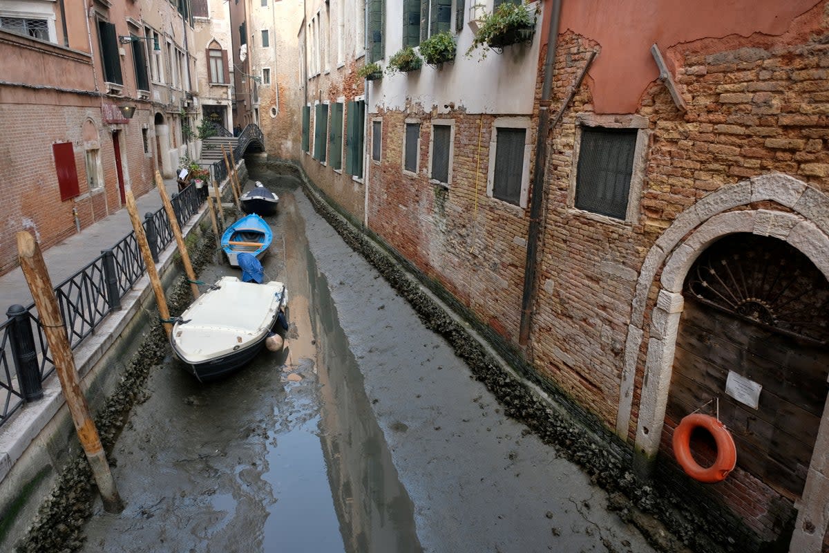 Problems in Venice are blamed on the lack of rain, a high pressure system, a full moon and sea currents (REUTERS)