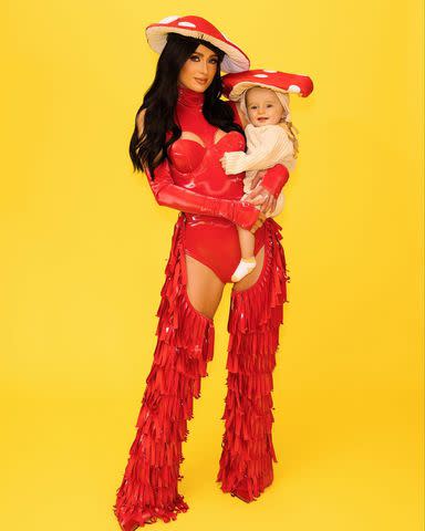 <p>Kevin Ostajewski</p> Paris Hilton poses with son Phoenix