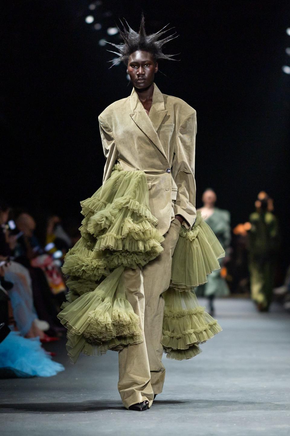 A model walks the Act N°1 runway during Milan Fashion Week.